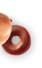 Photo of a glazed donut, with sprinkles.
